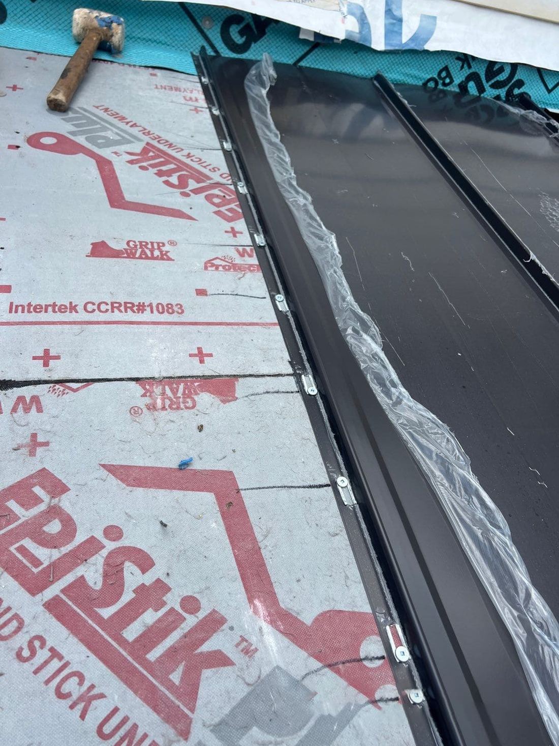 Self-adhering membrane run up to a metal drip edge