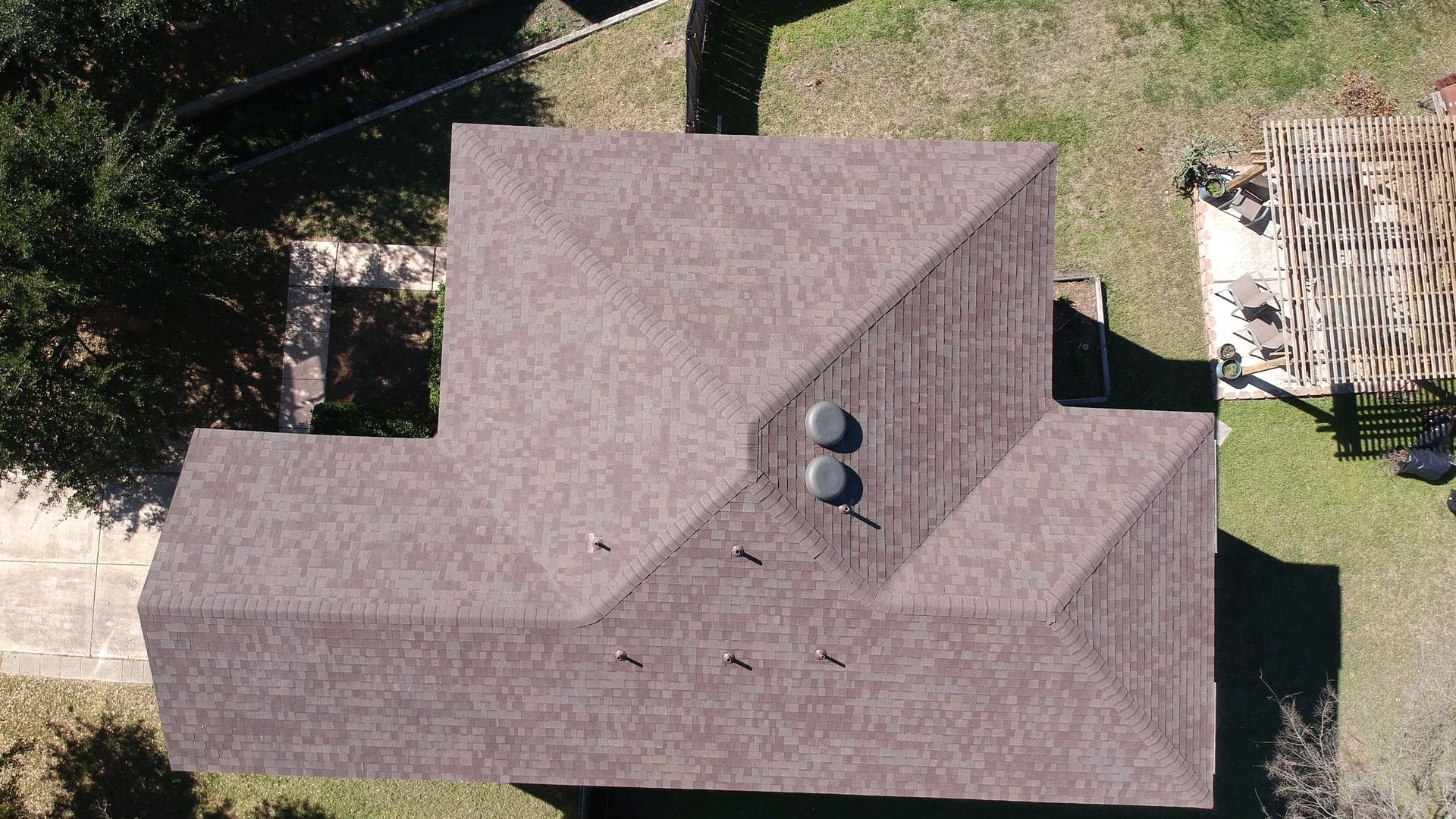 Shingle hip roof with two vents, seen from directly above