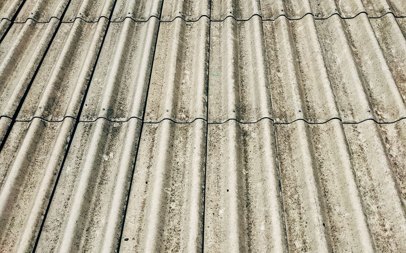 Weathered corrugated cement roof sheets, close up