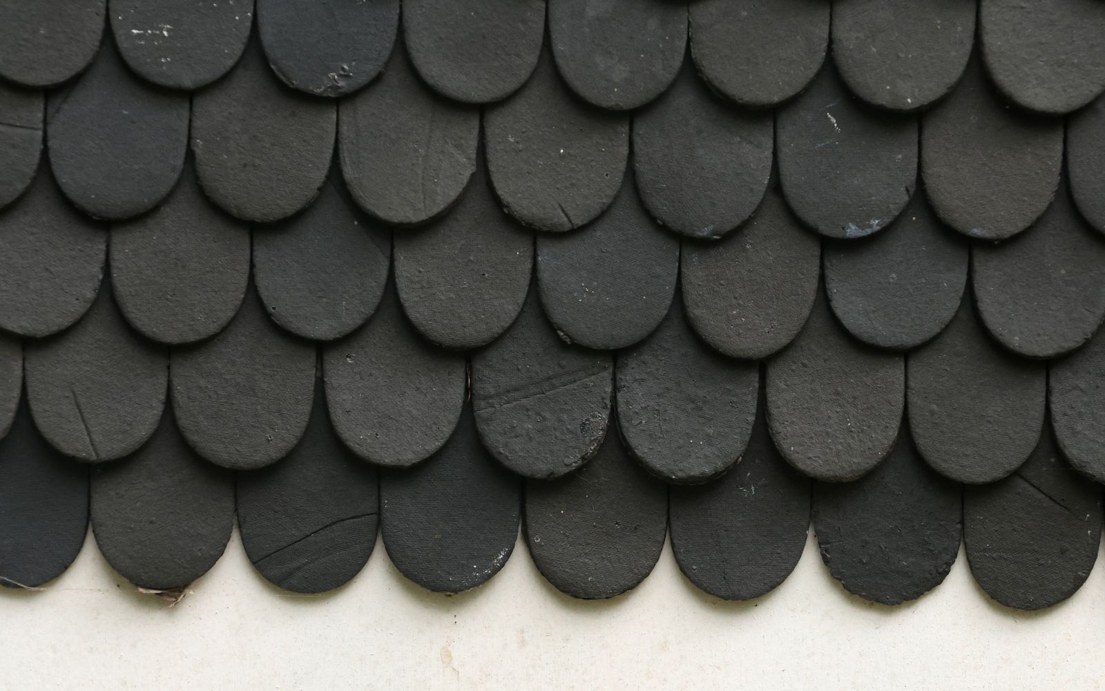 Dark scalloped slate, close up